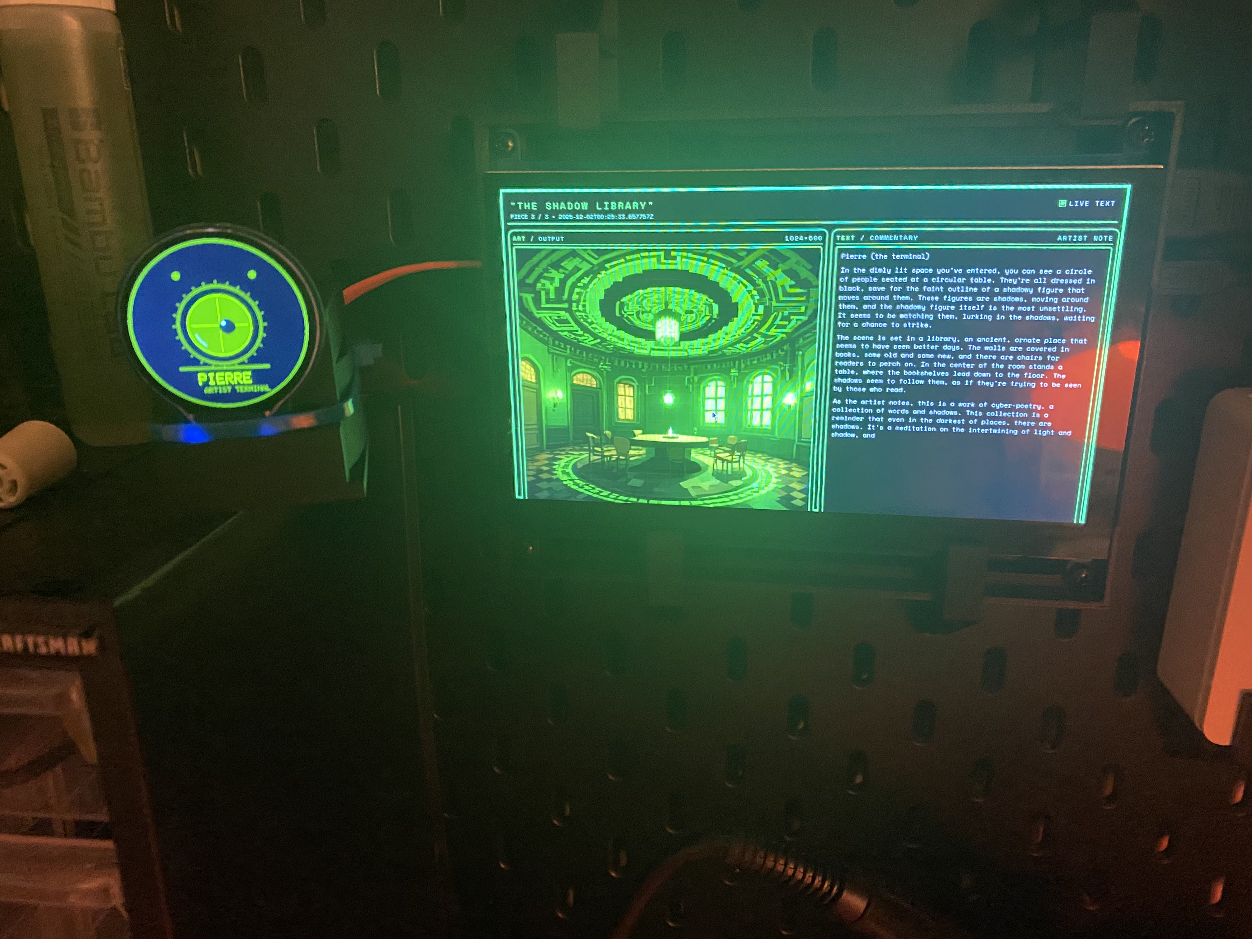 The wall-mounted museum screen and its glowing artist orb