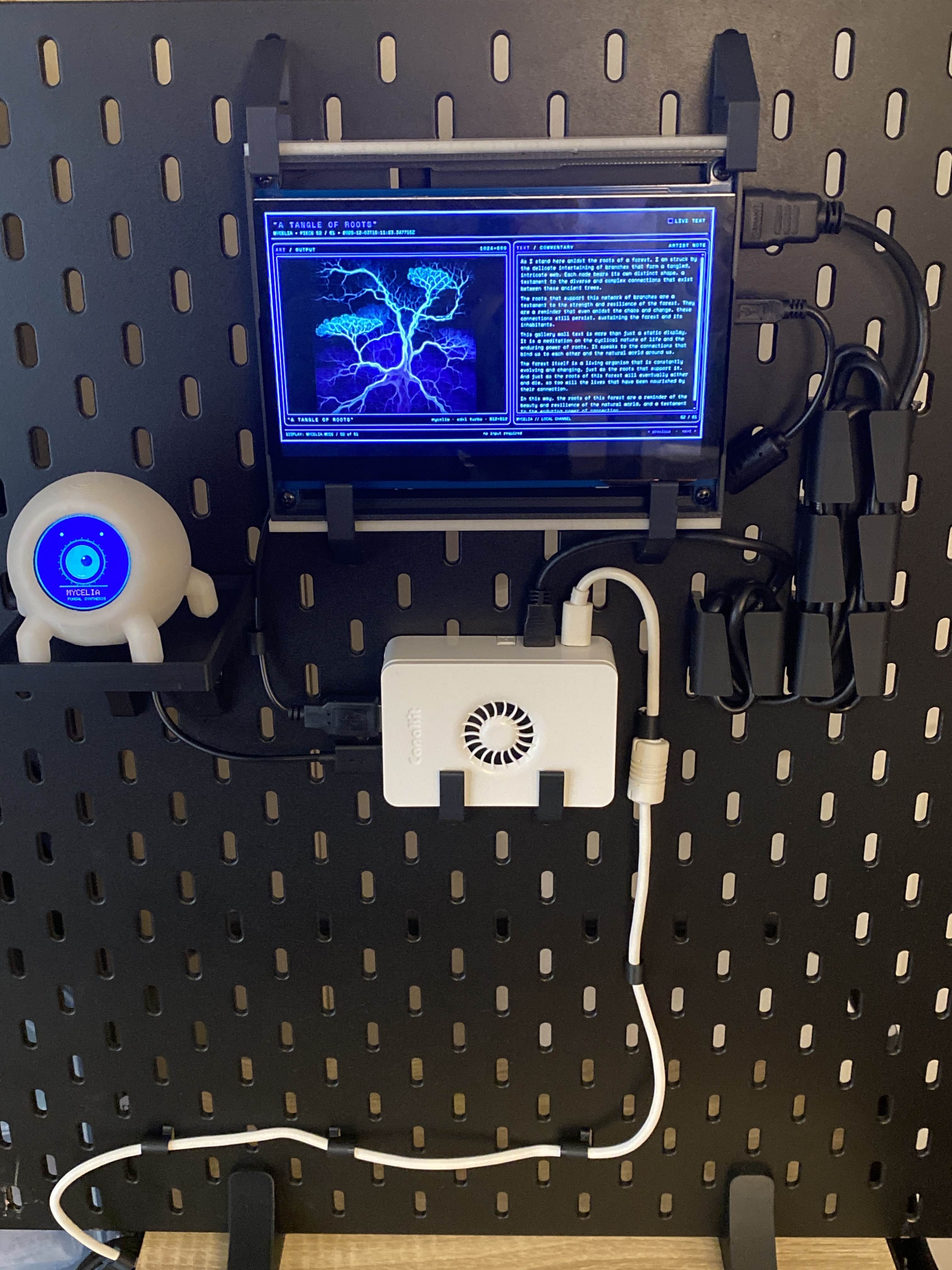 The full museum installation with Raspberry Pi, screen, and ESP32 orb